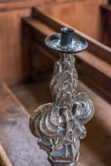 Poppyhead bench end acting as a candestick