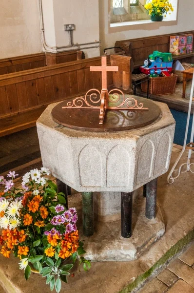 The 13th century Purbeck marble font