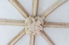 Medieval roof boss in the church porch