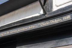 Charles Dickens quote over the door