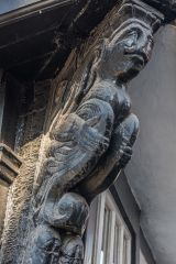 A carved wooden corbel