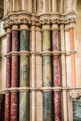 Multicoloured marble columns in the chancel