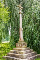 A slender churchyard cross