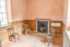 The 'squire's pew' and its fireplace, in the north transept