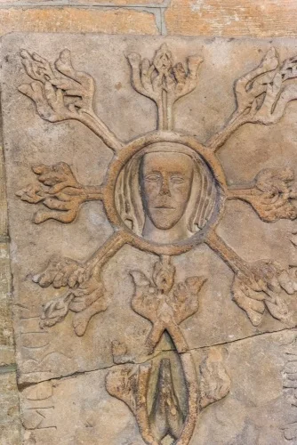 A beautifully carved medieval grave slab