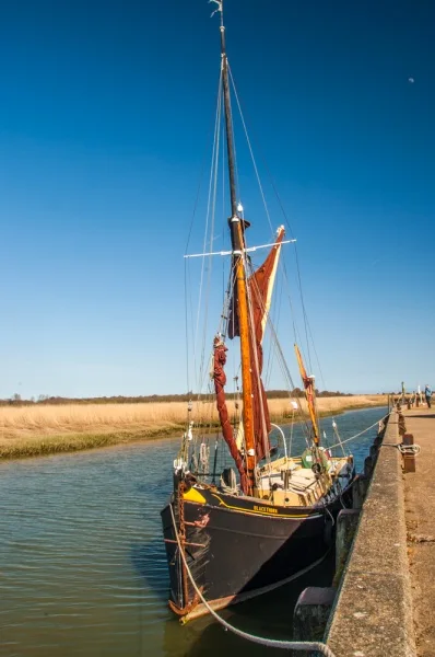 The Blackthorn sailing barge moored at Snape Maltings