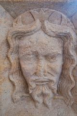 Head of Christ on the font