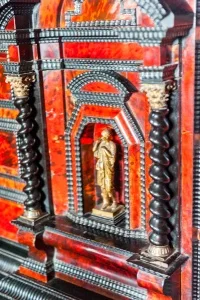 A lacquered Oriental cabinet