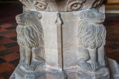 Lions on the font stem