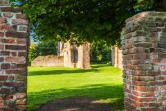 Entering the Tudor house grounds