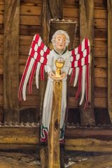 Carved and painted angel figure