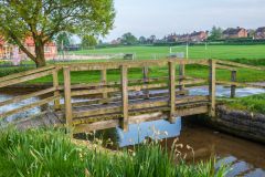 A footbridge on the village green