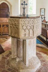 The medieval octagonal font stands