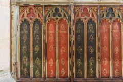 Painted panels on the 15th century screen base