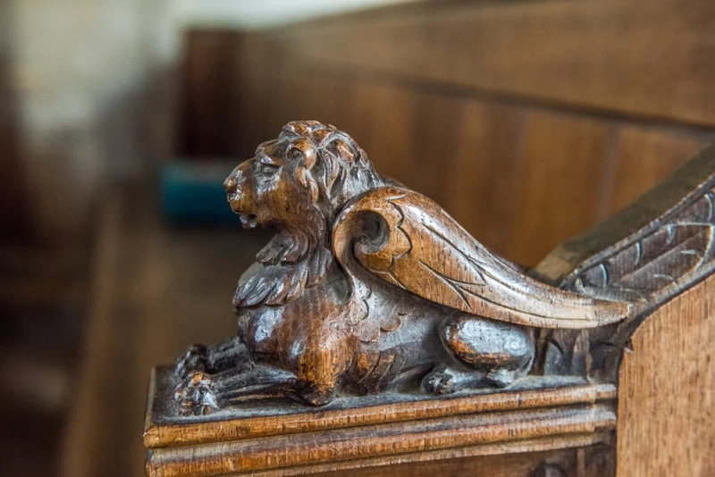 15th century bench end of a winged lion