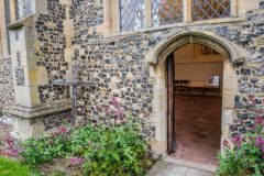 The main entrance in the chancel wall