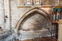 A medieval tomb niche in the chancel