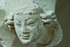Carved head, chancel