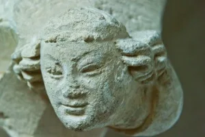 Carved head, chancel