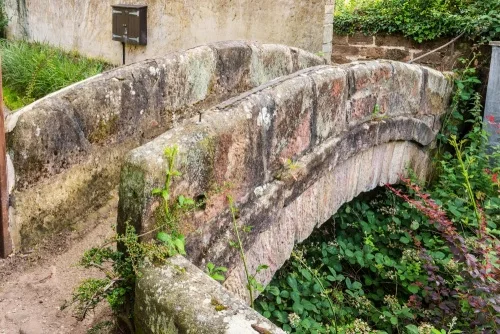 18th-century packhorse bridge to the Corn Mill