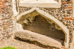 An unusual tomb niche outside the chancel