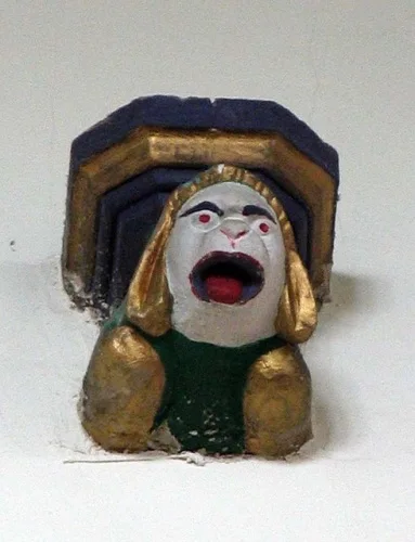 A painted medieval corbel head (c) John Salmon