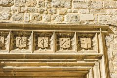 Heraldic shields, west tower doorway