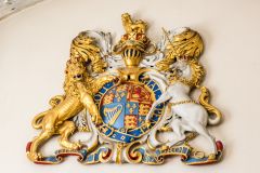 The gilded royal coat of arms