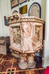 The richly carved marble pulpit