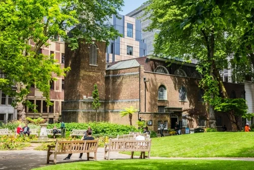 St Botolph without Aldersgate occupies a corner of the park