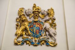 The gilded royal coat of arms