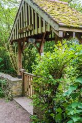 You approach the well through an attractive gateway