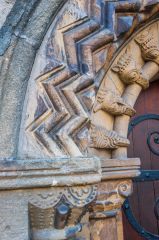 Oxford, St Ebbe's Church, Norman carving on the north side of the arch and capitals