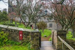 Entering the (rather wet) churchyard