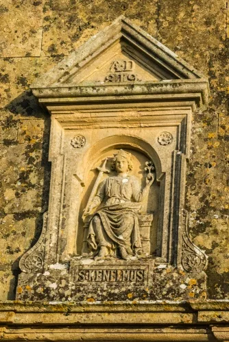 St Kenelm figure over the door