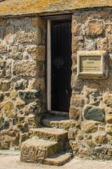 The granite steps to the chapel door
