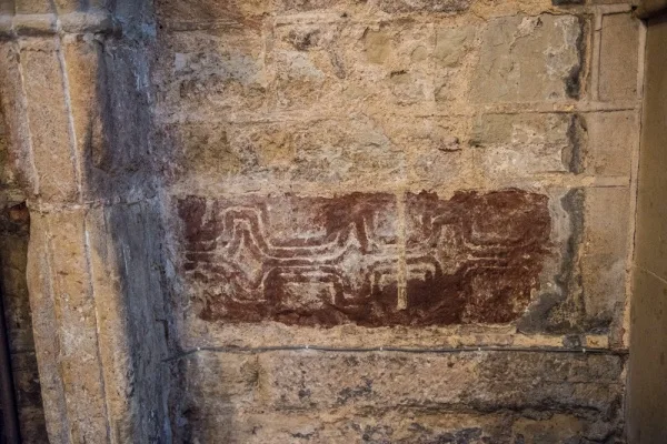 Roman carved stone in the west wall