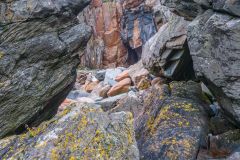 The cave through a natural rock arch