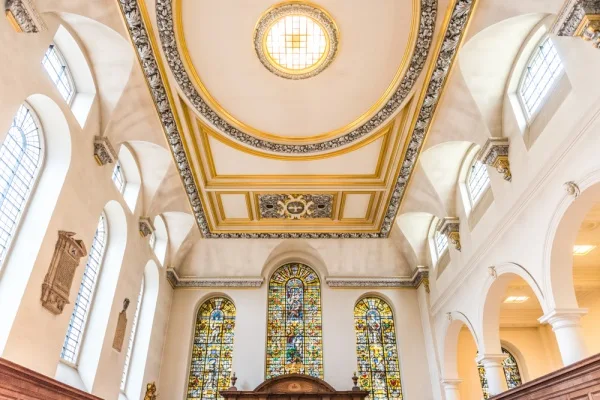 The ornately gilded ceiling