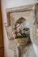 The pedestal holy water stoup