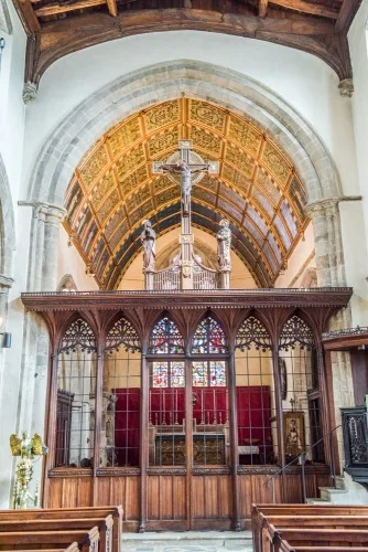 The richly carved chancel screen