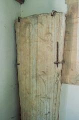 Medieval coffin lid with a floriated cross carving