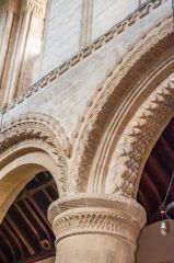 The beautifully-carved nave arcade