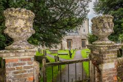 The ornate churchyard gates at Stinsford