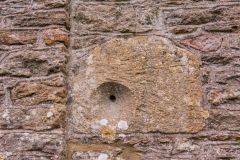 A mass dial set into the outer wall