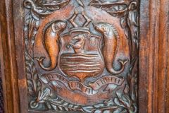 16th-century bench end with Trevelyan family arms