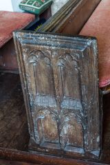 One of three medieval carved bench ends