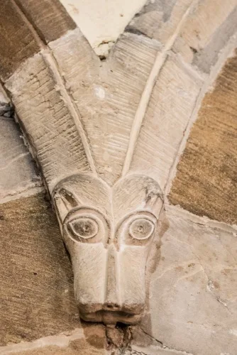 Anglo-Saxon beasthead carving, nave arcade