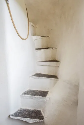 Slate steps meandering organically upstairs