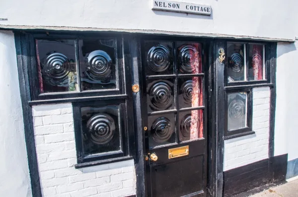 16th century Nelson Cottage, with ornate mullioned windows